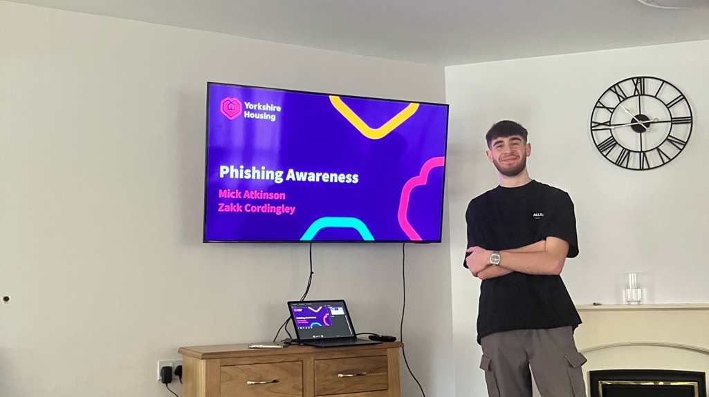 Zakk Cordingley smiling ready to start his cyber security presentation