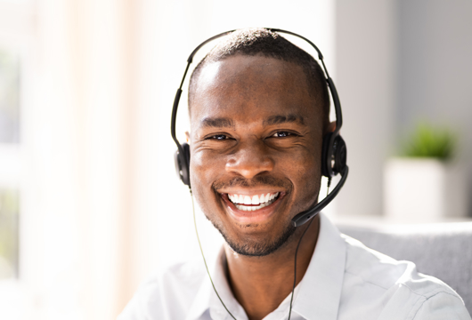 Smiling man wearing headphones