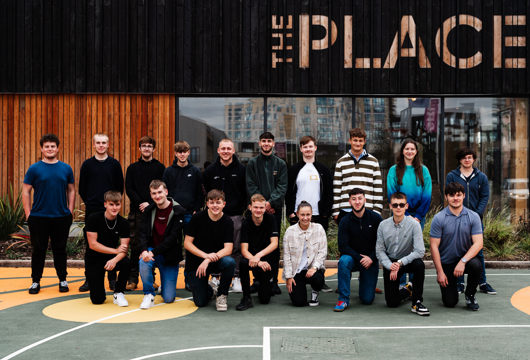 A group of colleagues, our apprentices, outside the place on their first day! 